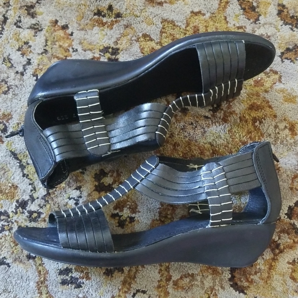 Black leather wedge sandals